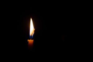burning-candle-isolated-on-black-background-concept-of-mourning-sadness-sorrow-commemoration-day